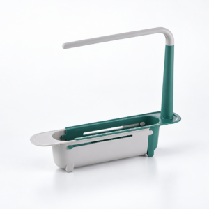 Support d'évier télescopique vert et gris clair, avec panier coulissant et barre porte-chiffon, sur fond blanc